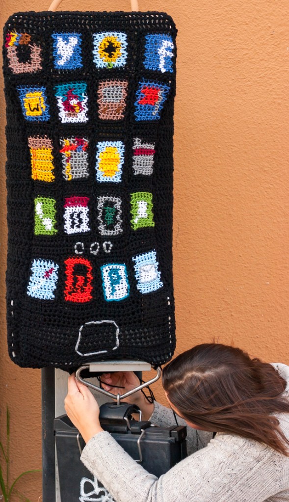 Yarn bombed pay phone