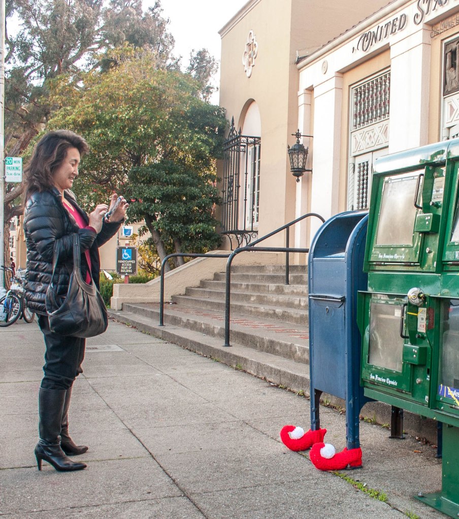 yarn bombed mailbox christmas elf