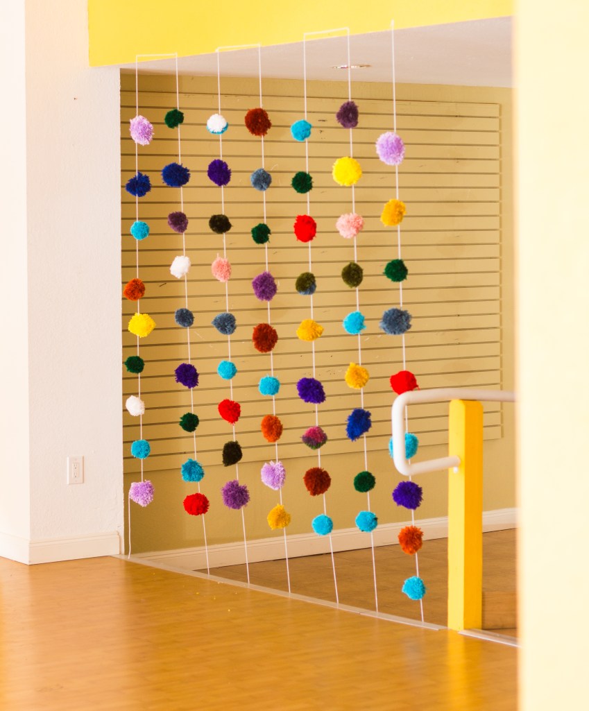pom pom curtain by the dapper toad