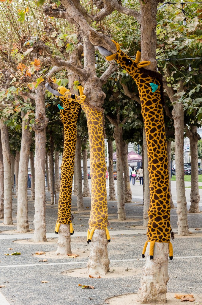 Knitting the Commons San Francisco Giraffe Yarn bomb by Knits for Life