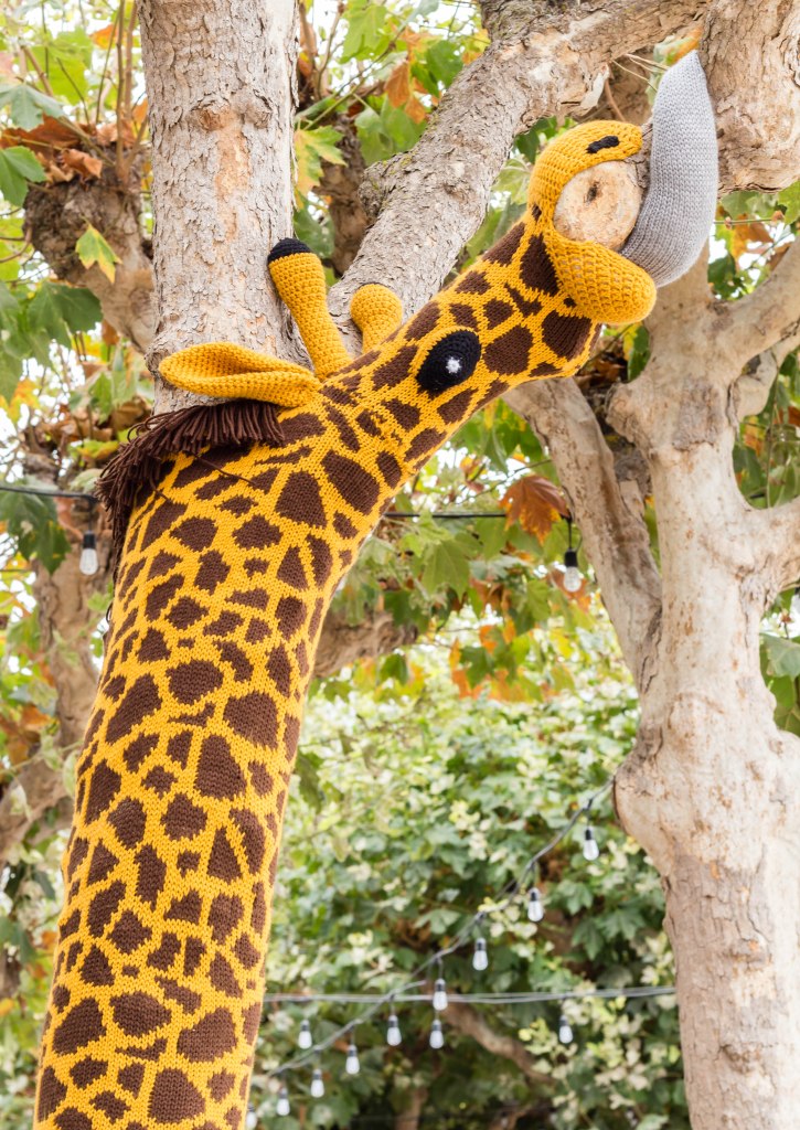 Knitting the Commons San Francisco Giraffe Yarn bomb by Knits for Life
