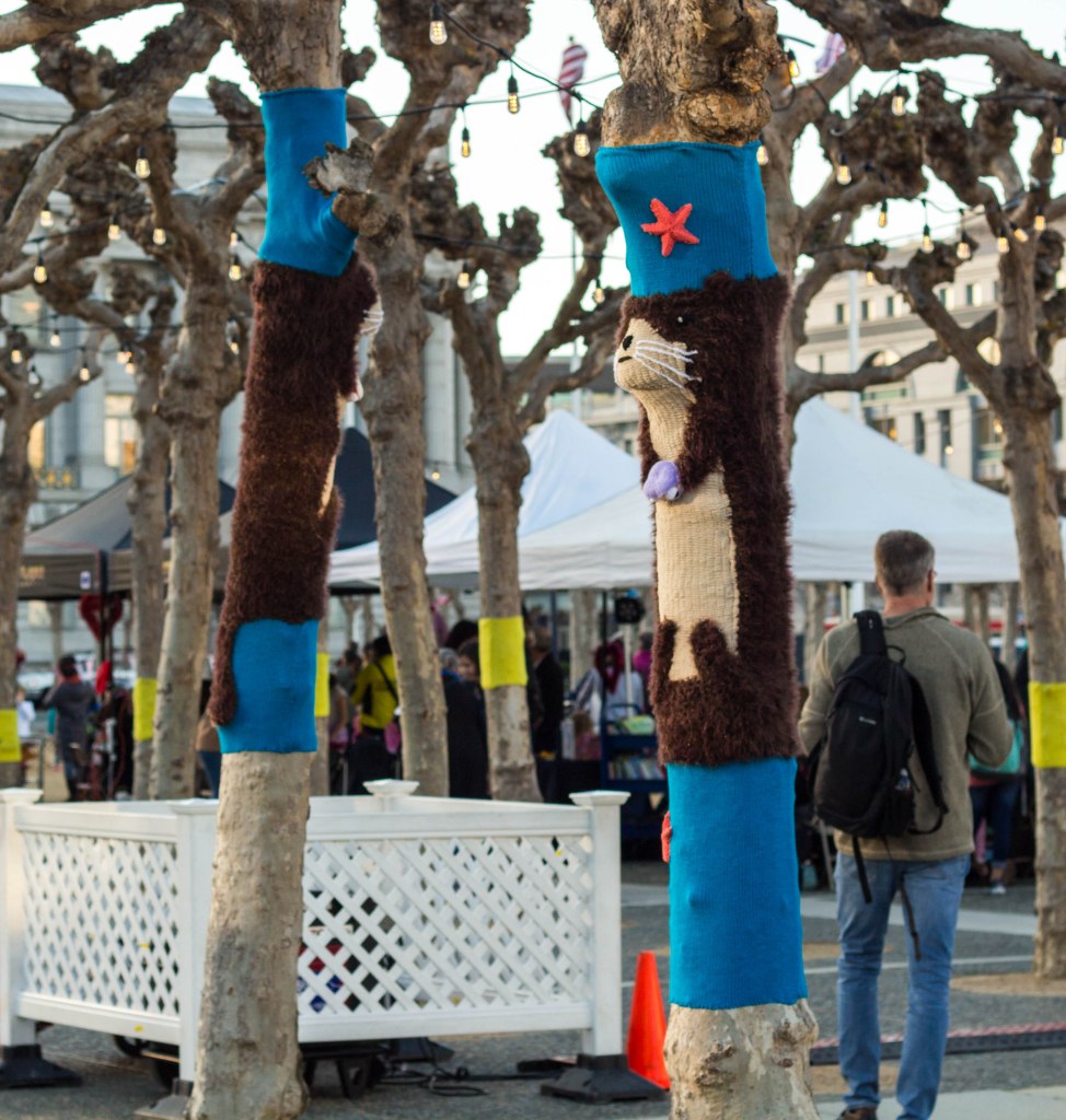 Sea Otter Tree Yarn Bomb by Knits for Life for Knitting the Commons in San Francisco Civic Center