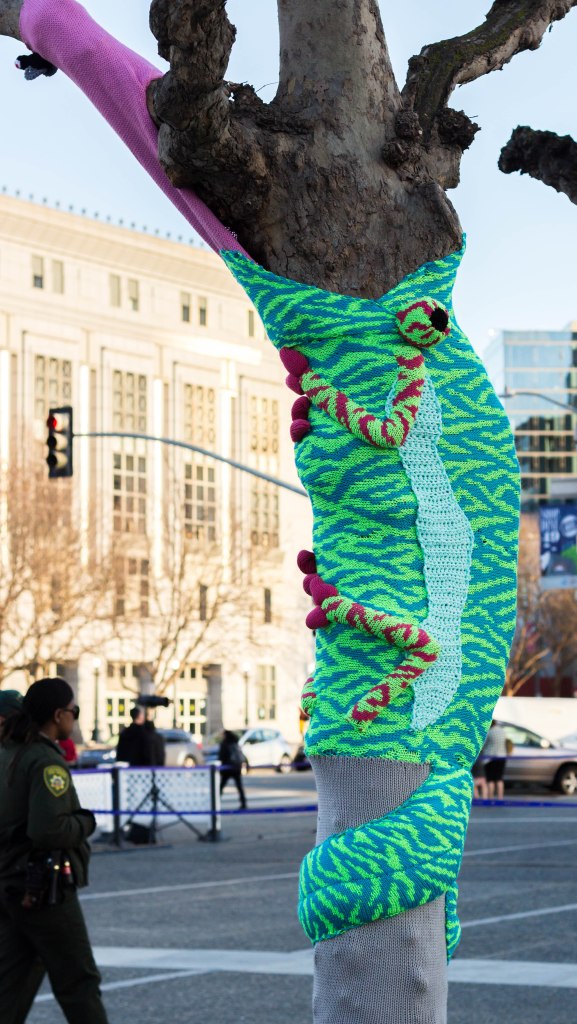 Chameleon Tree Yarn Bomb by Knits for Life for Knitting the Commons in San Francisco Civic Center
