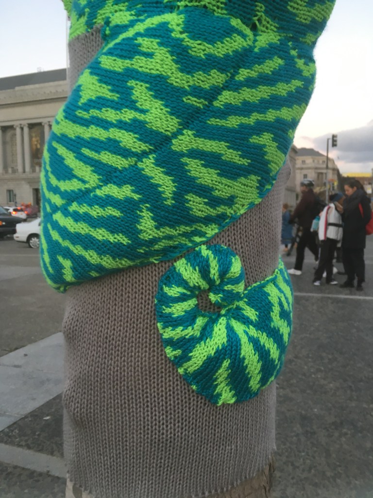 Chameleon Tree Yarn Bomb by Knits for Life for Knitting the Commons in San Francisco Civic Center