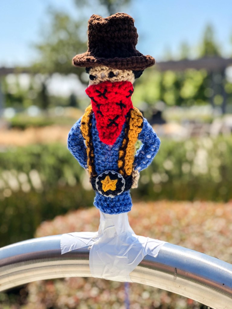Cowboy bike rack yarn bomb by Knits for Life