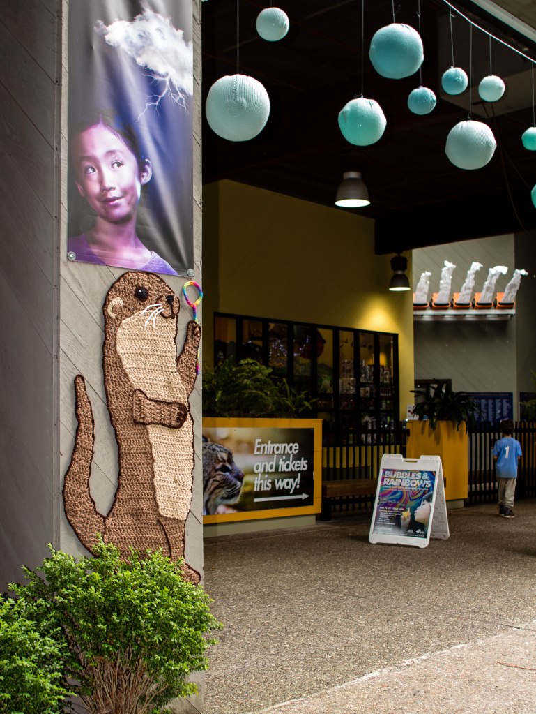 Curiodyssey x Knits for Life Bubbles & Rainbows Otter & Owl Yarnbomb