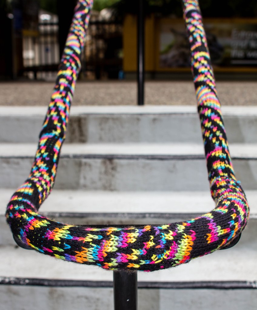 Curiodyssey x Knits for Life Bubbles & Rainbows Yarnbomb