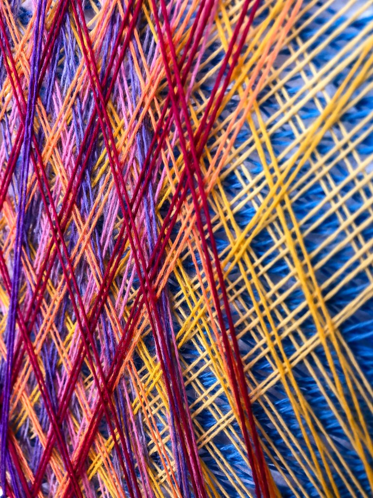 String art murals by Knits for Life